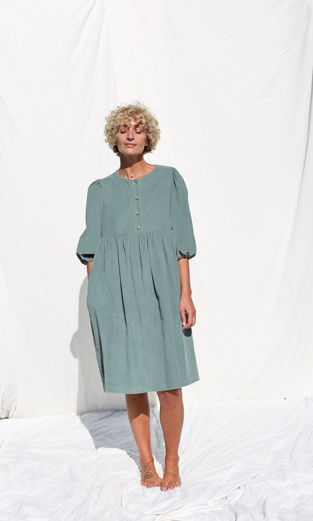 corduroy empire waist dress Vineyard Green Corduroy Snap Buttons Empire Waist Bracelet Sleeve Mini main image 0