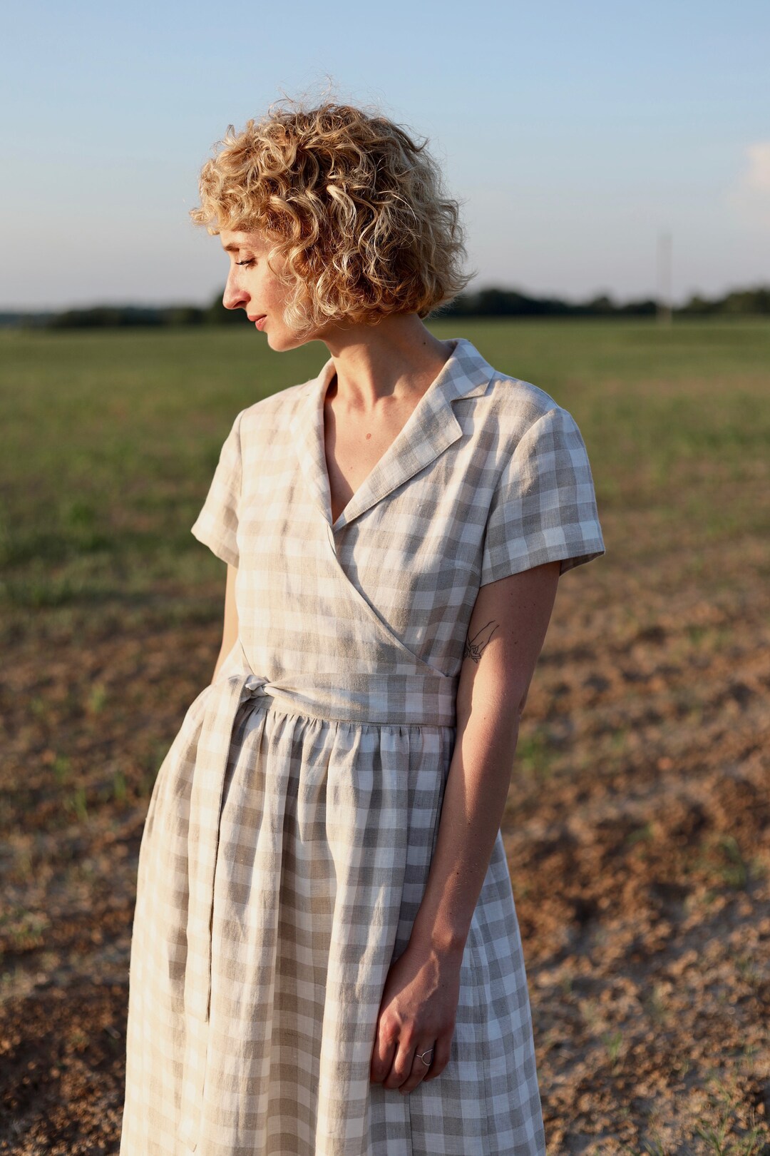 Uo anna linen mixed hotsell plaid midi wrap dress