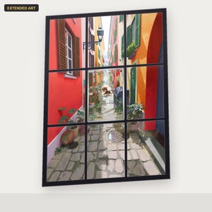 May include: A rectangular wall art piece featuring a window-pane frame overlaying a vibrant illustration of a narrow European-style alleyway with red, yellow, and orange buildings, cobblestone paths, potted plants, and a central Litleo trading card.