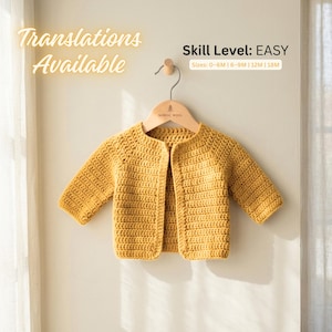 May include: A mustard yellow long-sleeve crochet cardigan hanging on a wooden hanger. The text on the image reads: Translations Available, Skill Level: EASY, Sizes: 0-6M | 6-9M | 12M | 18M. The garment features a simple open front design and textured stitching.
