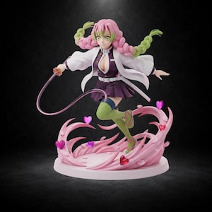 May include: A dynamic anime-style figurine of a character with pink and green braided hair, wearing a white haori over a dark purple uniform. The figure holds a thin, flexible sword and stands on a pink base decorated with swirling effects and hearts.
