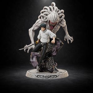 May include: A detailed figurine featuring a dark-haired character in a white jacket and black pants holding a katana, positioned in front of a large, pale, multi-limbed creature with a wide, toothy mouth, all mounted on a circular patterned base.