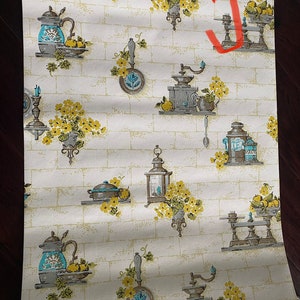May include: Vintage kitchen wallpaper with a white brick background and a repeating pattern of blue and gray kitchenware, yellow flowers, and lemons.