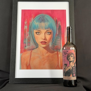 May include: A framed art print featuring a portrait of a person with short blue hair against a vibrant pink background, positioned next to a dark glass wine bottle with a label reading CYNIC RED WINE, featuring an illustration of a person holding a glass.