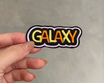 Color Gradient Word Embroidered Patch, Cloud Border Iron‑on Applique, Bright Text Badge for Bags & Denim.