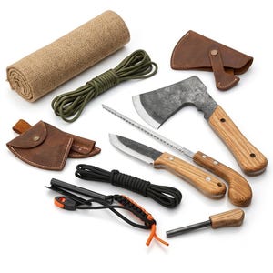 May include: A collection of outdoor tools including a hatchet with a wooden handle, a knife, a serrated saw blade, two leather sheaths, a roll of burlap, olive green and black paracord, and a fire starter with a wooden handle and orange cord.