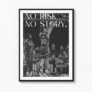 May include: A black and white framed wall art print featuring a basketball player wearing jersey number 30 in the act of shooting. The text NO RISK NO STORY is printed in white at the top. The scene includes a coach and spectators in the background.