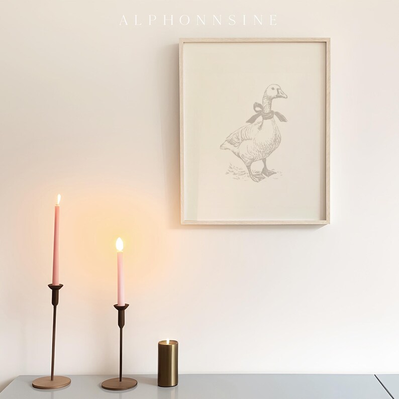 Sweet gosling wall decor for a nursery — carefully crafted line art featuring a large bow, connecting nature and minimalism.
