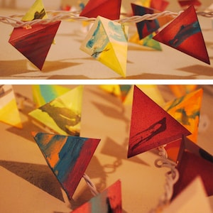 Paper Lantern Garland - MAGMA - handmade light garland in burgundy, peach, lime, turquoise, and orange, with brushstroke details