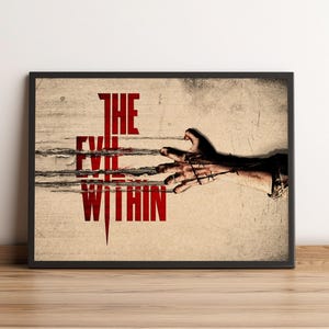 May include: A rectangular wall art print featuring a beige, distressed background with the red text THE EVIL WITHIN. A human hand reaches from the right side, entangled in dark, sharp barbed wire that cuts horizontally across the red lettering.
