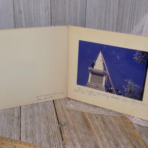 May include: A vintage photo of a church steeple with a caption that reads "Old Meeting House, a steeple of our Green River Episcopal Church".