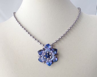 Flickering Floral Pendant in Blue on Pearl Chain