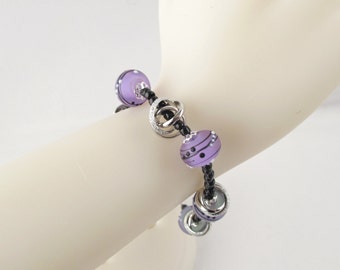 Purple and Black Bracelet with Floating Silver Rings and Toggle Clasp