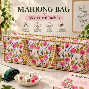May include: A rectangular quilted mahjong bag featuring a pink and green floral pattern with a yellow and white checkered trim. The bag measures 35 x 11 x 6 inches and includes two matching fabric handles for carrying the game set.