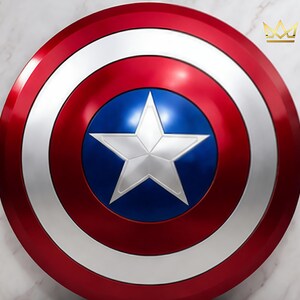 May include: A circular shield featuring a metallic red outer ring, a silver middle ring, and a deep blue center circle. A large, five-pointed silver star is centered within the blue circle. A small gold crown icon is visible in the top right corner.
