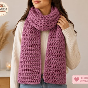 May include: A chunky mauve crochet scarf with a textured waffle stitch pattern, worn over a cream-colored ribbed long-sleeve sweater. The image includes a circular logo with the text SHAHBAZ DIGITAL WORLD and a pink rectangular digital download label.