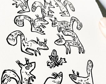 Ten Squirrels and an Acorn - lino cut print