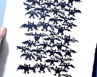 Lots and lots of bats - lino cut