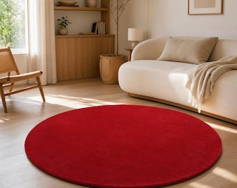 Effen rood rond vloerkleed, modern minimalistisch vloerkleed, opvallend accentkleed.