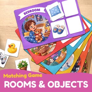 May include: A matching game titled Rooms & Objects featuring colorful cards with illustrations of a bedroom, a yellow rubber duck, a game controller, and a potted plant. The game includes cards with images of a blue pillow and bear slippers.