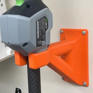 Soporte de pared para desbrozadora EGO de 56 V / Soporte de montaje universal para desbrozadoras de cabezales múltiples / Organización de garajes y cobertizos / Paisajismo
