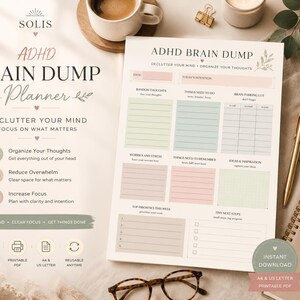 May include: An ADHD Brain Dump planner sheet with sections for random thoughts, to-do lists, and priorities. The page features pastel-colored boxes, headers like 'Declutter Your Mind', and a clean layout. It is presented alongside a gold pen and glasses.