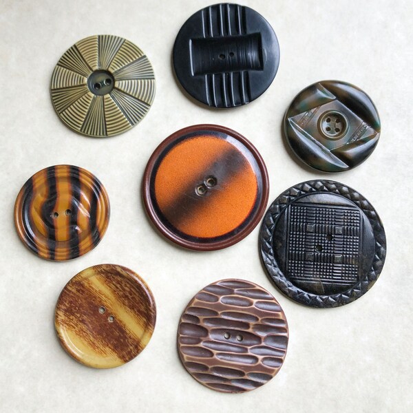 8 celluloid buttons, NBS Large, all nice!