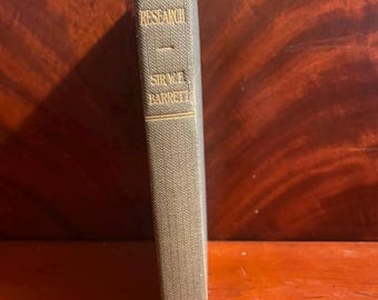 May include: A hardcover book with a textured olive-green spine. The gold-stamped text on the spine reads: PSYCHICAL RESEARCH, SIR W.F. BARRETT, and WILLIAMS & NORGATE. The book is positioned vertically, showing the title and author details clearly.