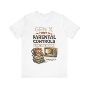 May include: A white t-shirt featuring a graphic with the text GEN X WE WERE THE PARENTAL CONTROLS Raised Before The Internet. The design includes a vintage orange rotary telephone, a retro television set, and a stack of cassette tapes.