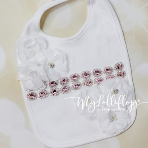 Baby Girl White Cotton Bib with 2 Rows of Rhinestones and Off White Flowers Beautiful