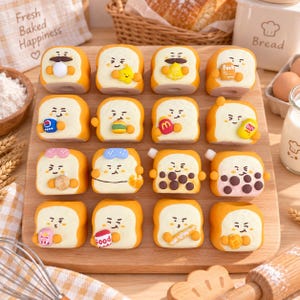 May include: A collection of sixteen small, square-shaped bread-themed figurines arranged on a wooden board. Each figurine features a unique cartoon face and holds a different miniature item, including food, drinks, and various small objects.