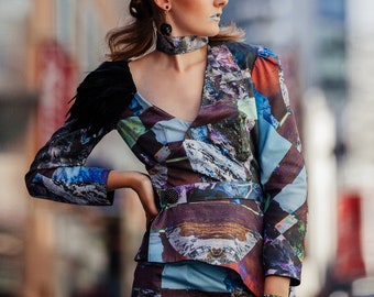 Avant garde asymmetrical glitchy mountain digital printed suit, skirt and jacket with feather detail