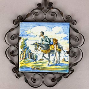 Vintage Majolica or Talavera style Wall Plaque w/ Wrought Iron Scrolling Frame, Don Quixote w/Donkey, Hand Painted, Measures 10 1/2 x 9 1/2