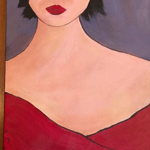 May include: An acrylic painting of a woman's face and upper body. The woman has red lips, black hair, and is wearing a red dress. The background is a muted purple. The painting is on a canvas.