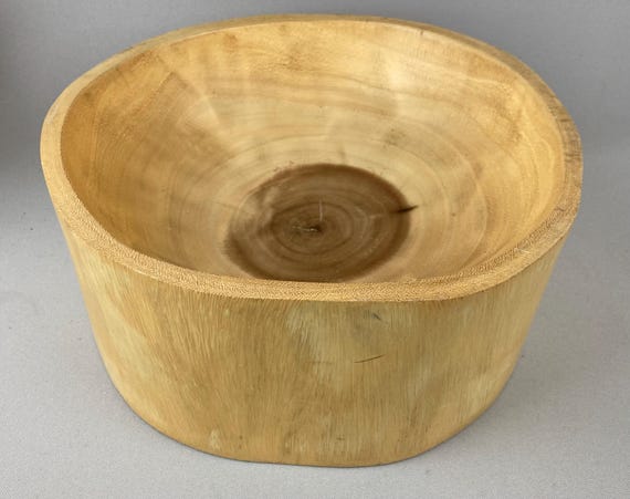 A substantial vintage MCM hand-carved bowl at 11.5" wide and 5" deep — the kind of sculptural object that anchors a credenza or coffee table.