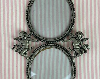 Vintage PictureFrame, Double Frame, with Baby Angels, Pewter Tone Finish, Oval Picture Size,  2 1/2 x 2 1/8", Made in Holland
