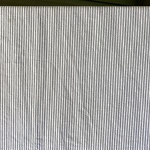 May include: White fabric with thin black stripes. The fabric has a subtle texture.