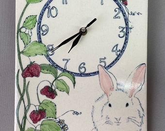 Vintage "Santa Barbara Ceramic Design" Wall Clock, Hand Painted, Rabbit with Strawberries, Battery Clock, Measures 11 1/2 x 7 3/4"