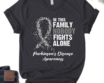 Parkinson's Disease Awareness T-shirt, In This Family Nobody Fights Alone, Parkinson's Disease Fighter, Parkinson's Disease Warrior SKUJ64