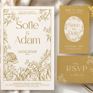 May include: A wedding invitation suite featuring a large cream card and two smaller gold cards with gold botanical line art. The text includes names Sofie & Adam, the date 14.02.2028, and RSVP details. The design incorporates floral illustrations.