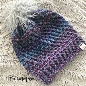 Crocheted Slouchy Beanie: Textured Woman's Hat with Pom
