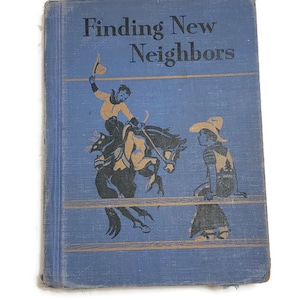 May include: A blue book with the title "Finding New Neighbors" in gold lettering. The cover features a black and white illustration of a cowboy riding a horse and a girl standing nearby.