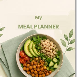 Peut inclure: Une couverture de planificateur de repas avec le texte My MEAL PLANNER en haut et Organize, Save, Eat Better en bas. Le centre montre un bol rempli d'avocat tranché, de tomates cerises, de quinoa, de pois chiches et de morceaux de concombre.
