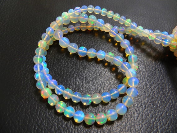 Ethiopian Opel 18 Inches Line 26.35 Caret good Quality Natural Stone Smooth polish tumbled Beads Size 3x5 To 3x9 mm