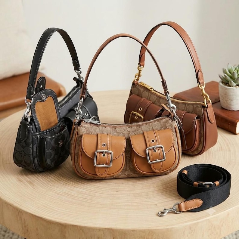 These are the Coach Ashton Shoulder Bags in signature jacquard and smooth leather, featuring distinctive front buckle pockets and detachable straps.
