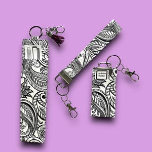 ¡Listo para enviar! Llavero con estampado de cachemira, llavero con bálsamo labial y portabolígrafos. Accesorio divertido para la muñeca, regalo para profesores. Correa para billetera con borlas en blanco y negro