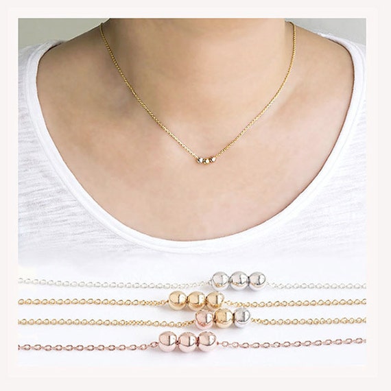 Items similar to Tiny Triple Ball Bead Necklace, Gold / Silver / Pink