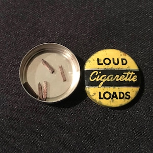 loud cigarette Vintage Loud Cigarette Loads Gag Tin - 1930s