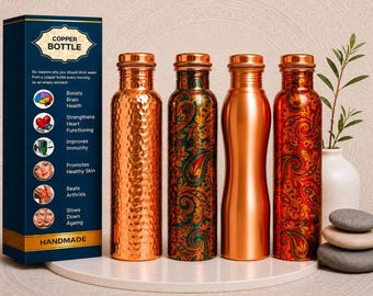 May include: Four copper bottles standing next to a blue box labeled COPPER BOTTLE. The first bottle has a hammered texture, the second features a green and gold paisley pattern, the third is smooth polished copper, and the fourth has a red paisley design.