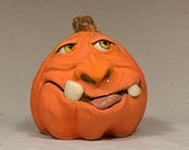 CERAMIC PUMPKIN , wheel thrown, hand altered and sculpted. Just a friendly little pumpkin to help you celebrate the fall season.